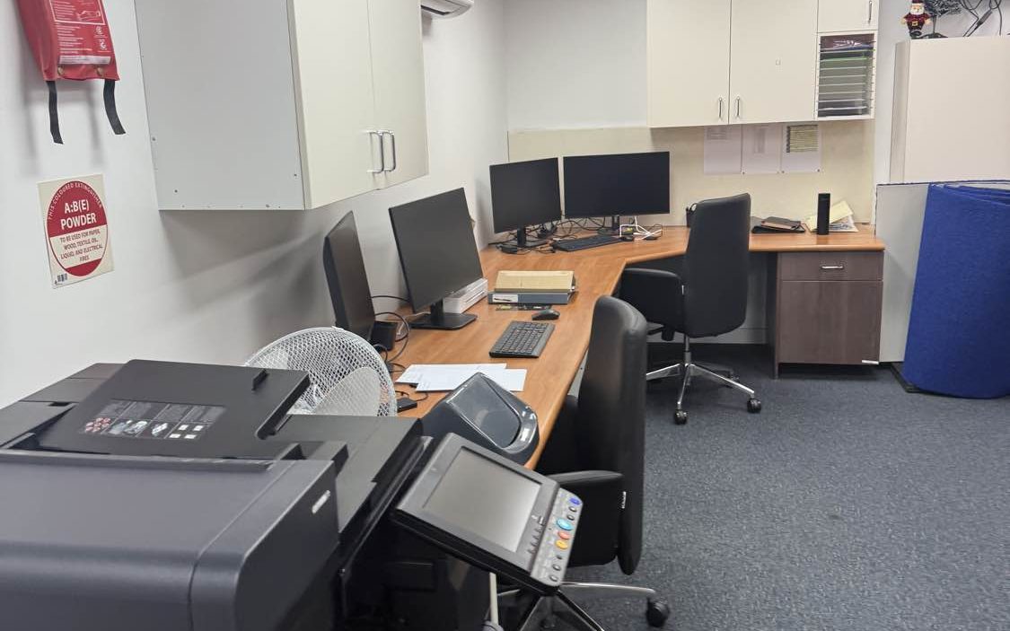 An office and print area after a Coasties commercial clean